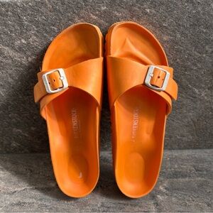 Birkenstock Vibrant Orange Slides with White Buckle